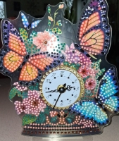 Diamond painting klok met vlinders